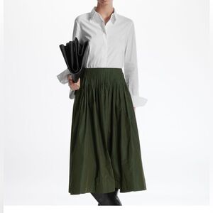 COS Pintuck A Line Taffeta skirt with pockets in pine green. Size 4